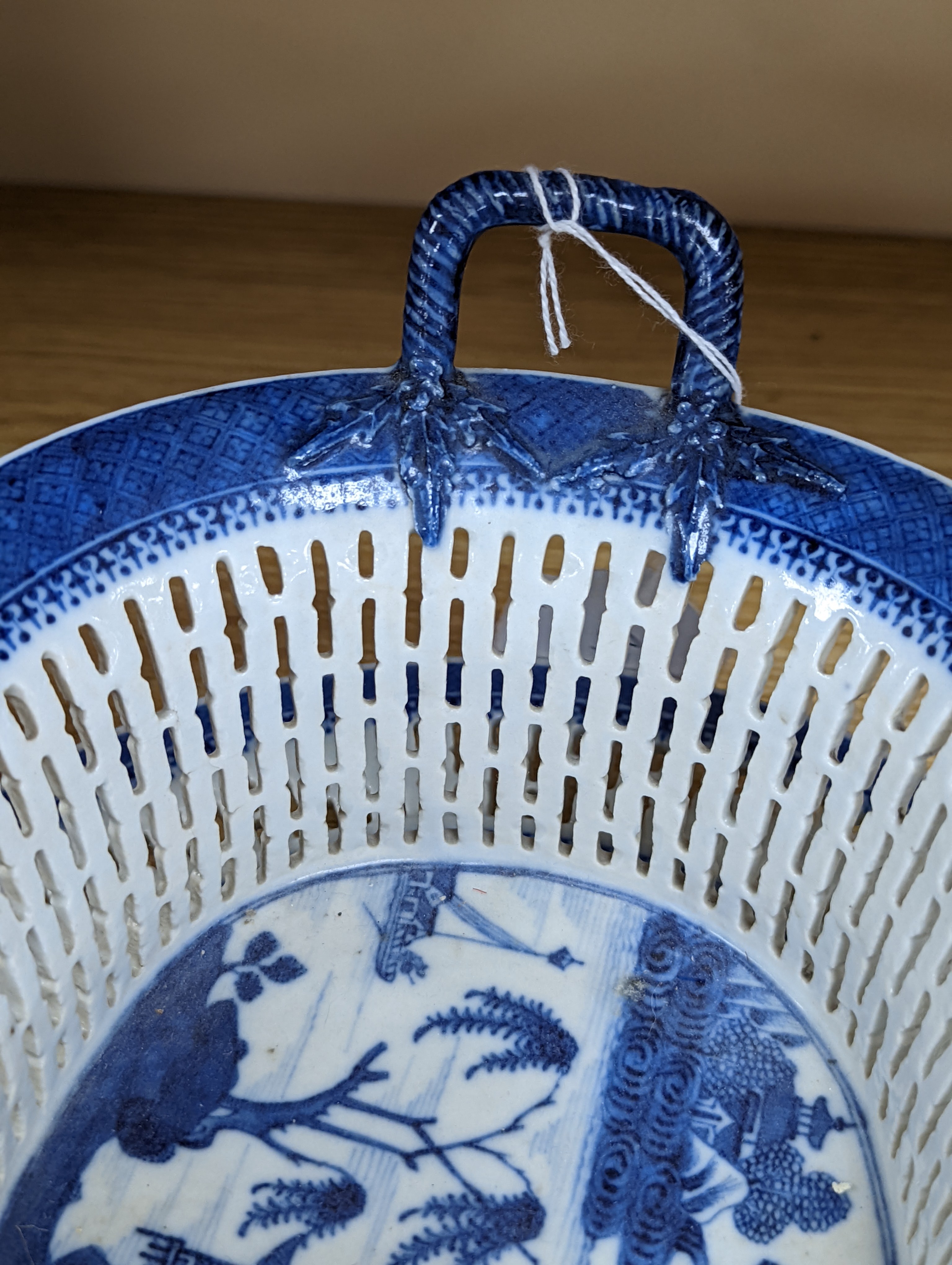 A Chinese blue and white chestnut basket and stand, Qianlong period, basket 11 cms high.